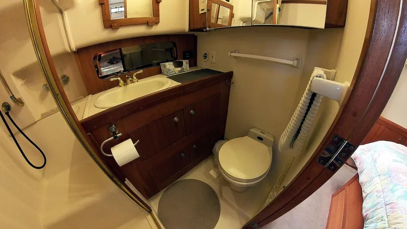 Slide: The Image of Master Head Vanity and Toilet - 18