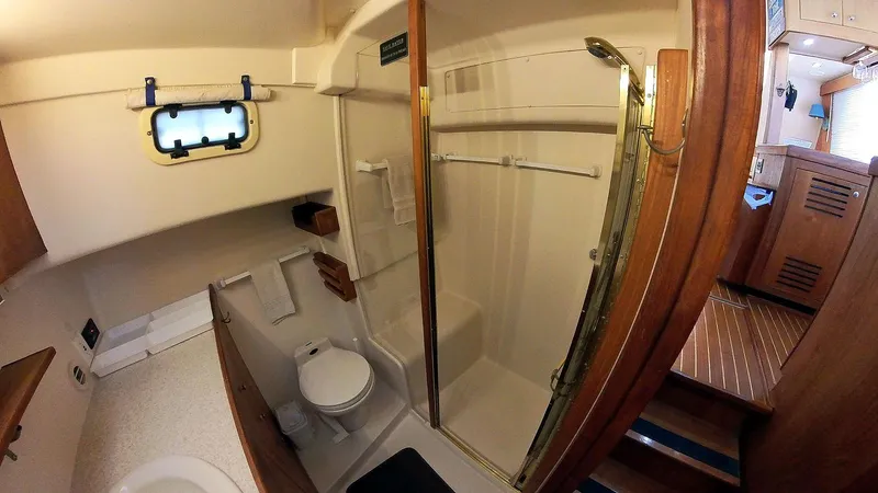 Slide: The Image of Guest Head Toilet and Shower - 25