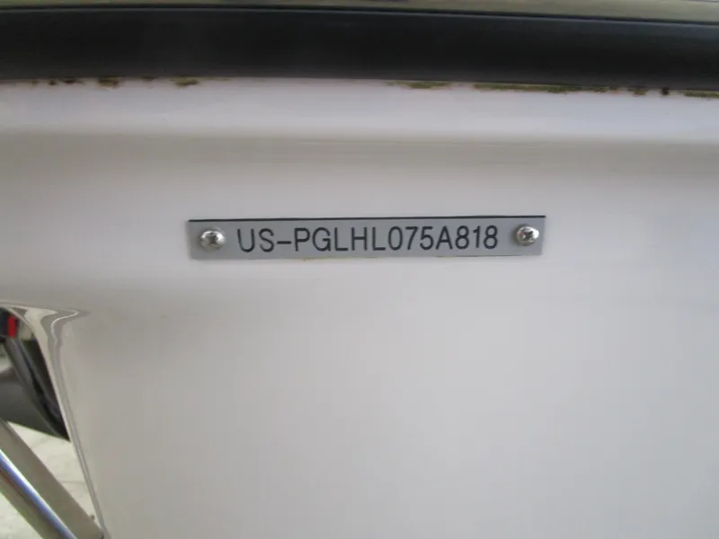 Slide: The Image of 2018 Glastron GT180 boat hull identification number plate. - 16
