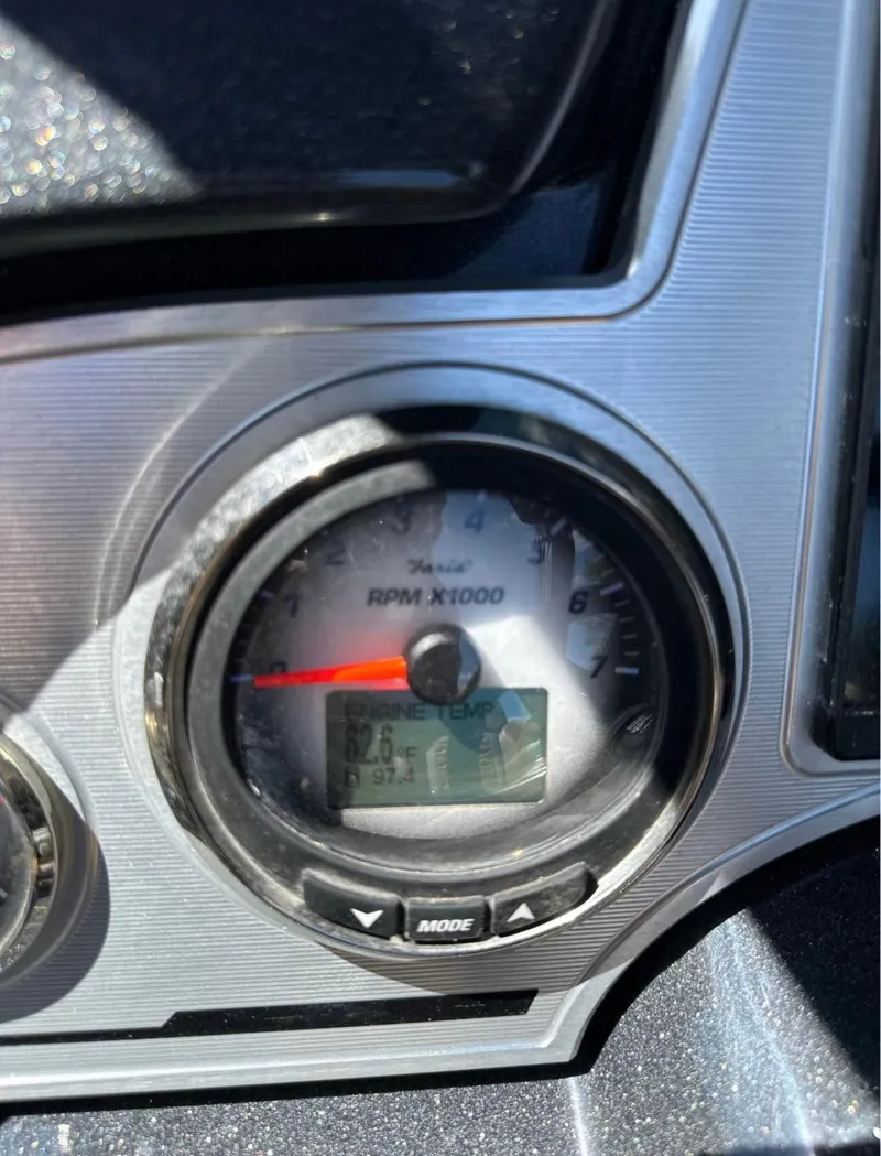 Slide: The Image of 2023 Crest Continental NX 270 dashboard showing RPM gauge in sunlight. - 11