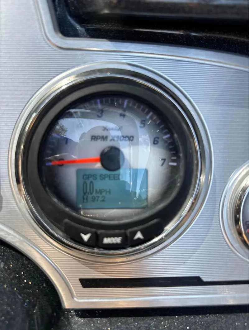 Slide: The Image of 2023 Crest Continental NX 270 dashboard showing RPM gauge and GPS speed display. - 12