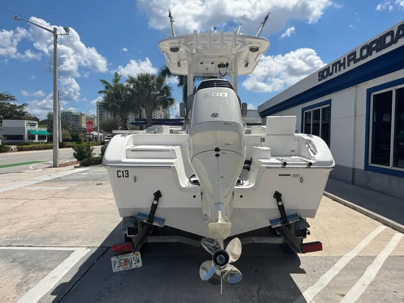 Slide: The Image of 2021 Sea Pro 239 Center Console boat on trailer, sunny day, South Florida location. - 3