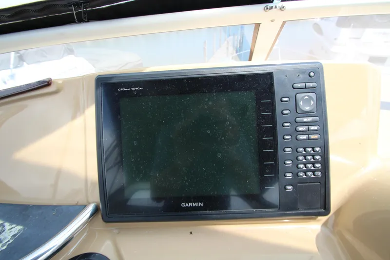 Slide: The Image of Garmin GPS device on 2002 Carver 366 Motor Yacht dashboard. - 10