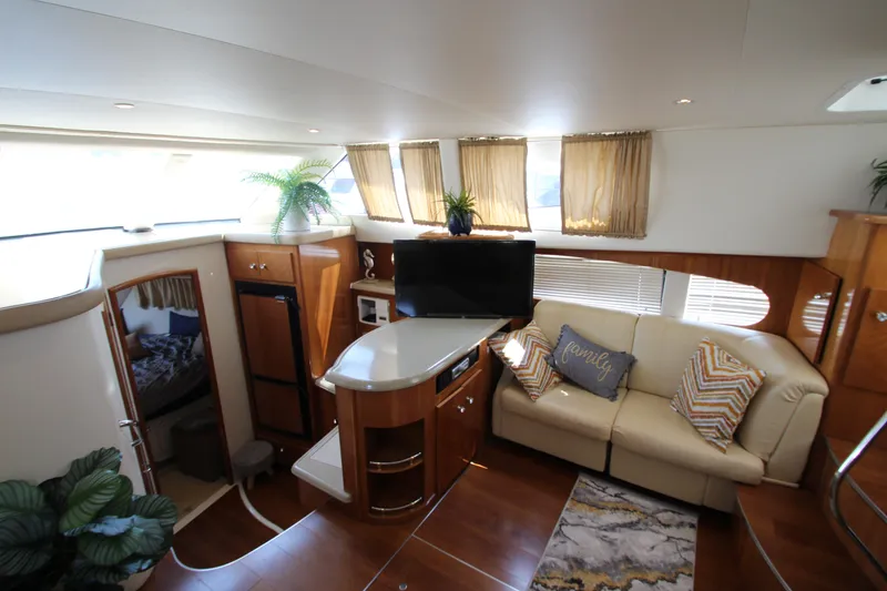Slide: The Image of Luxurious interior of 2002 Carver 366 Motor Yacht with modern furnishings and decor. - 28
