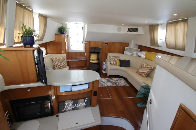 Slide: The Image of Interior of 2002 Carver 366 Motor Yacht with cozy seating and modern amenities. - 32