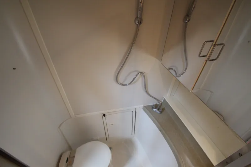 Slide: The Image of Bathroom interior of 2002 Carver 366 Motor Yacht with shower and toilet. - 48