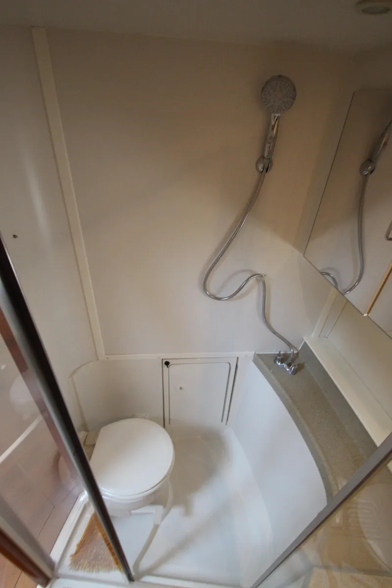 Slide: The Image of Bathroom interior of 2002 Carver 366 Motor Yacht with shower and toilet. - 49