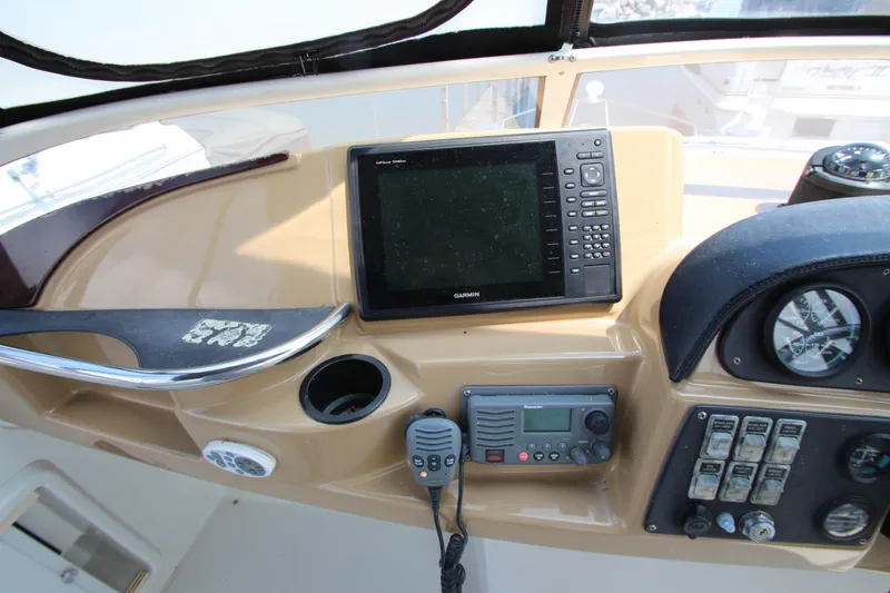 Slide: The Image of Control panel of a 2002 Carver 366 Motor Yacht with navigation equipment. - 9