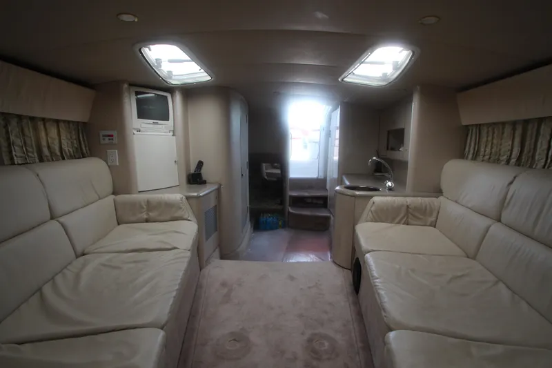 Slide: The Image of Interior of 2001 Formula 400 Super Sport yacht with plush seating and modern amenities. - 18