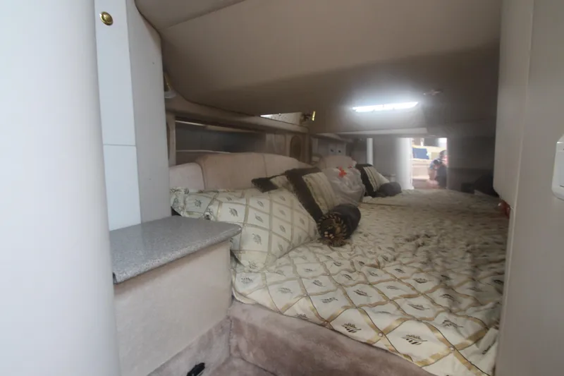 Slide: The Image of Interior cabin of 2001 Formula 400 Super Sport with cozy bedding and ambient lighting. - 25