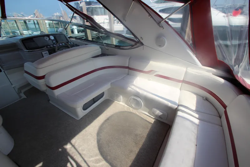 Slide: The Image of Interior of 2001 Formula 400 Super Sport boat with white and red seating. - 33