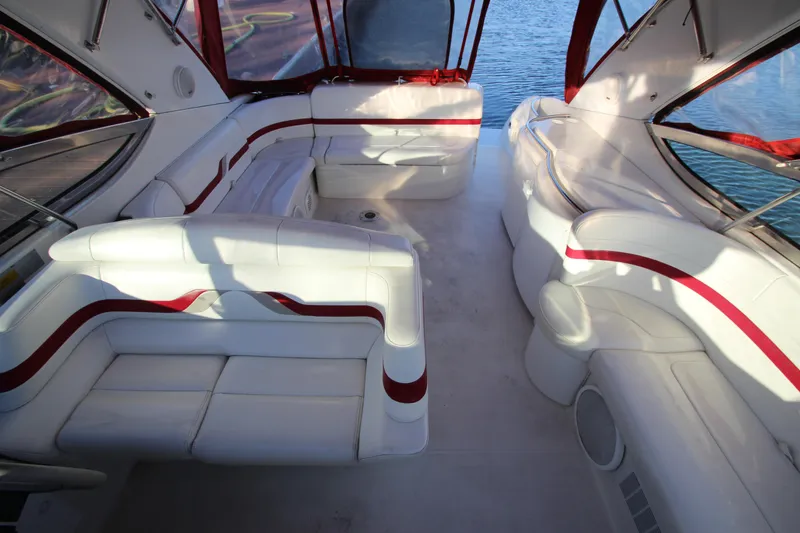 Slide: The Image of Luxurious interior of a 2001 Formula 400 Super Sport boat with white and red seating. - 6
