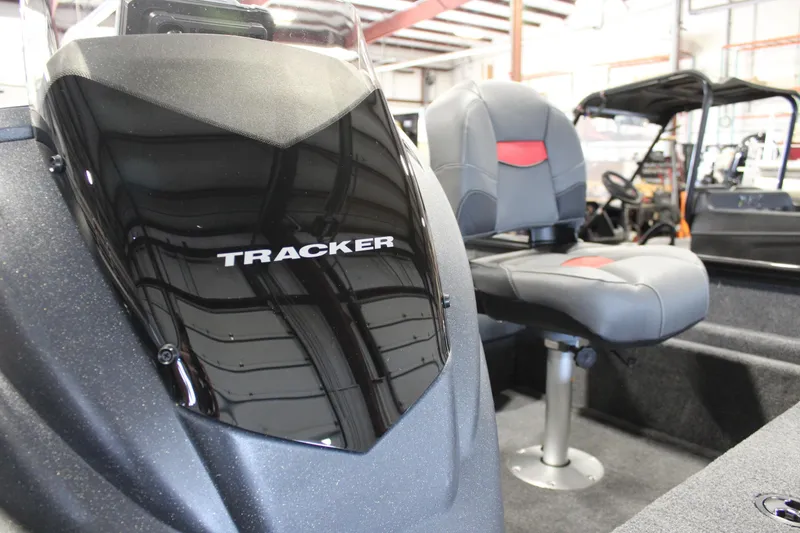 Slide: The Image of 2025 Tracker Pro Team 175 boat interior with seating and console. - 12
