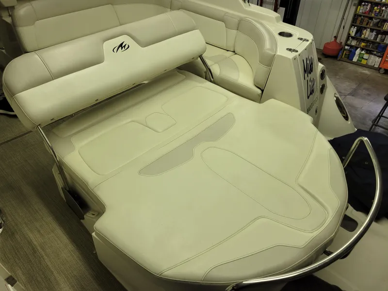 Slide: The Image of 2008 Monterey 315 Sport Yacht interior with beige seating and sleek design. - 15