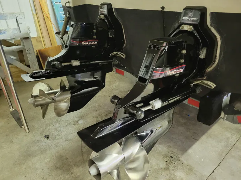 Slide: The Image of 2008 Monterey 315 Sport Yacht with dual MerCruiser outdrives in a garage setting. - 28