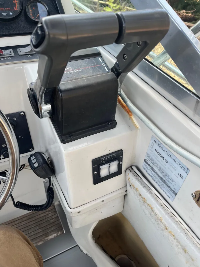 Slide: The Image of Control panel of a 1989 Wellcraft 250 Sportsman boat cockpit. - 3