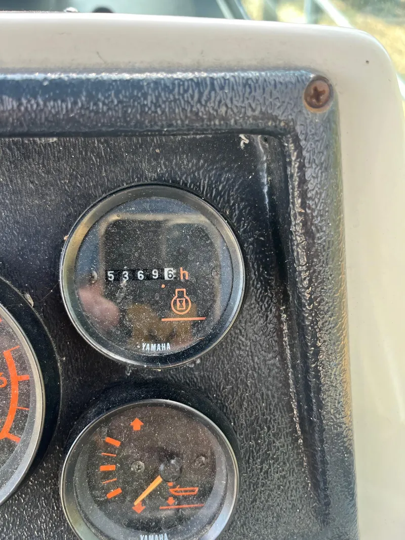 Slide: The Image of Close-up of 1989 Wellcraft 250 Sportsman boat dashboard gauges. - 4