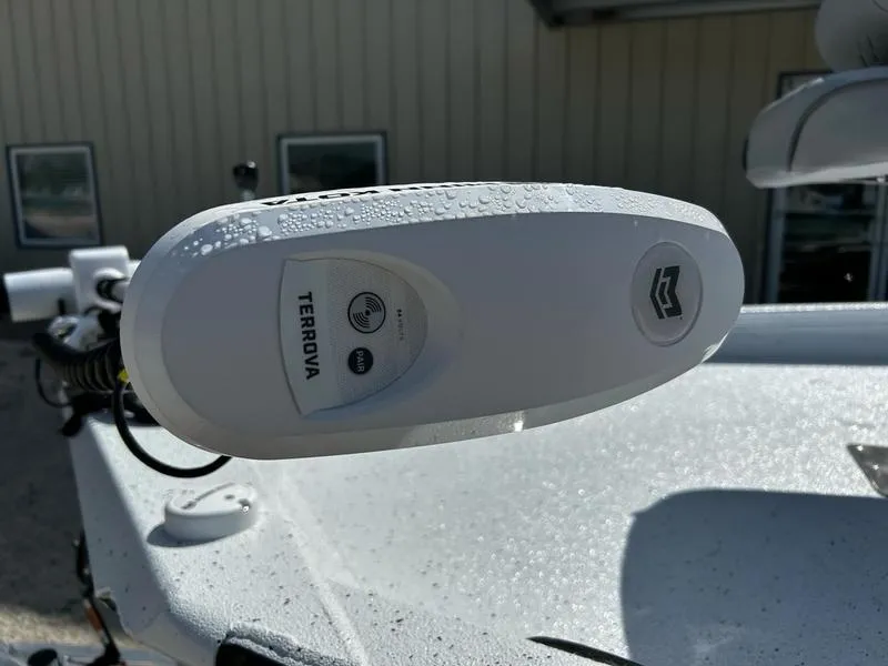 Slide: The Image of Close-up of a 2025 Xpress H22B boat with a Terrova trolling motor. - 8