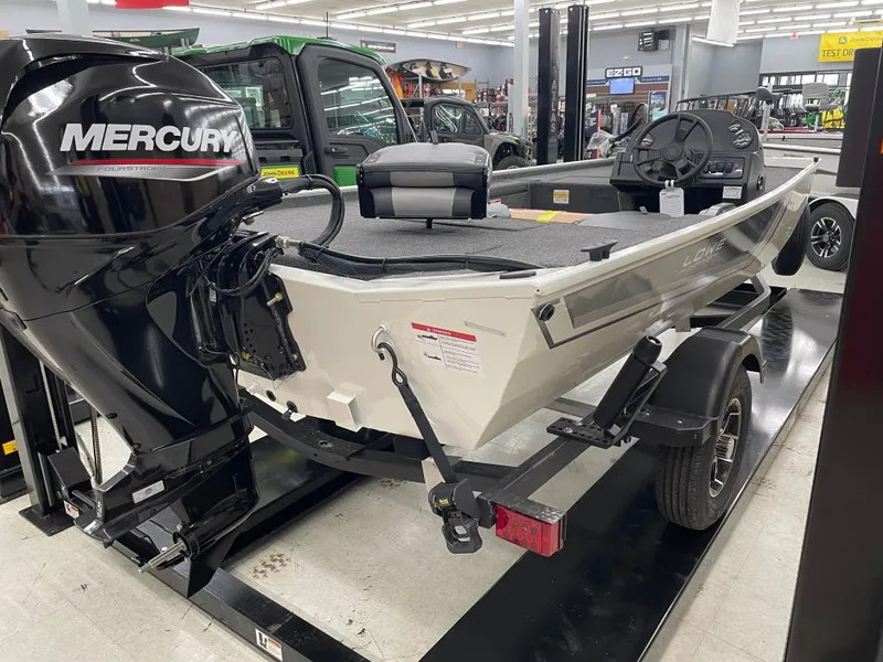 Slide: The Image of 2025 Lowe Skorpion 16 boat with Mercury engine on display in showroom. - 3