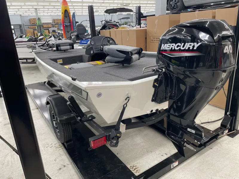 Slide: The Image of 2025 Lowe Skorpion 16 boat with Mercury 40 engine on trailer in showroom. - 5