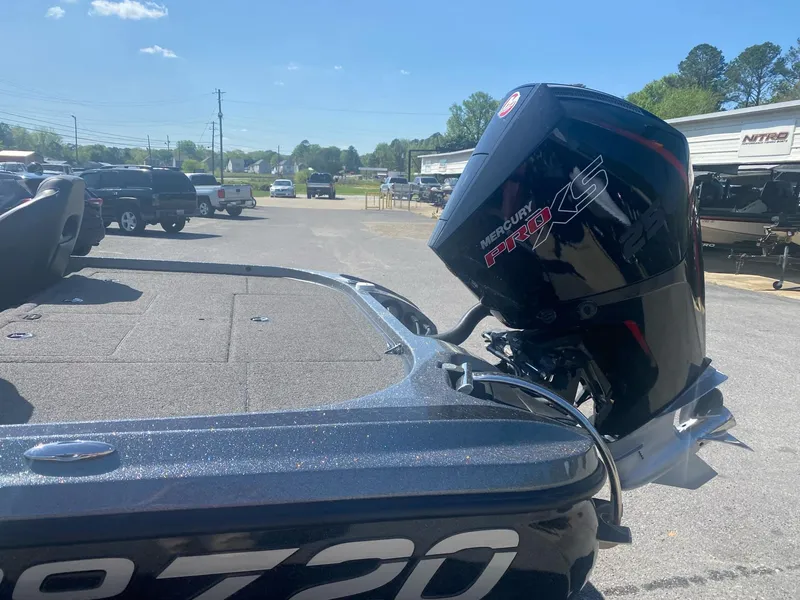 Slide: The Image of Nitro Z20 Pro 2022 boat with Mercury Pro XS engine in a parking lot. - 5