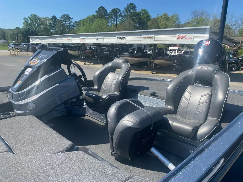 Slide: The Image of 2022 Nitro Z20 Pro boat interior with two seats and steering console. - 7