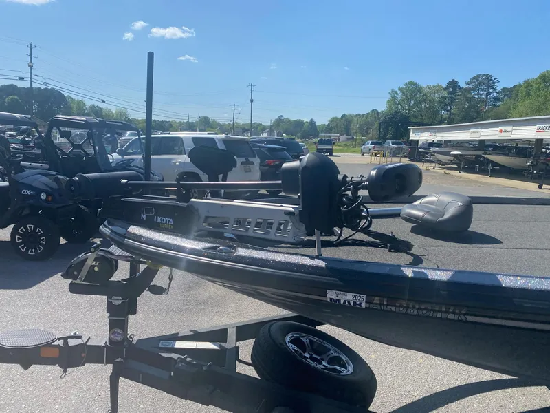 Slide: The Image of 2022 Nitro Z20 Pro boat on trailer in outdoor dealership lot. - 8