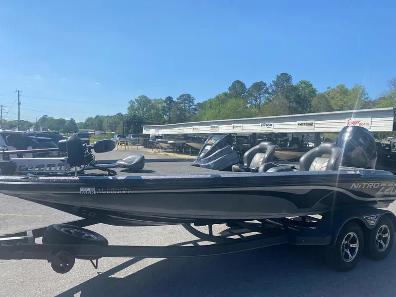 Slide: The Image of 2022 Nitro Z20 Pro boat on trailer in parking lot, sunny day. - 9