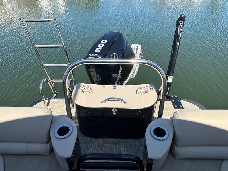 Slide: The Image of 2020 Avalon Catalina Platinum Quad Lounger boat with 300 HP motor on calm water. - 12