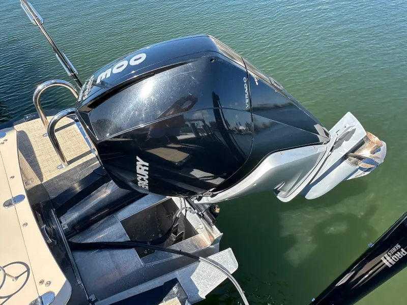 Slide: The Image of 2020 Avalon Catalina Platinum boat with Mercury outboard motor on water. - 13