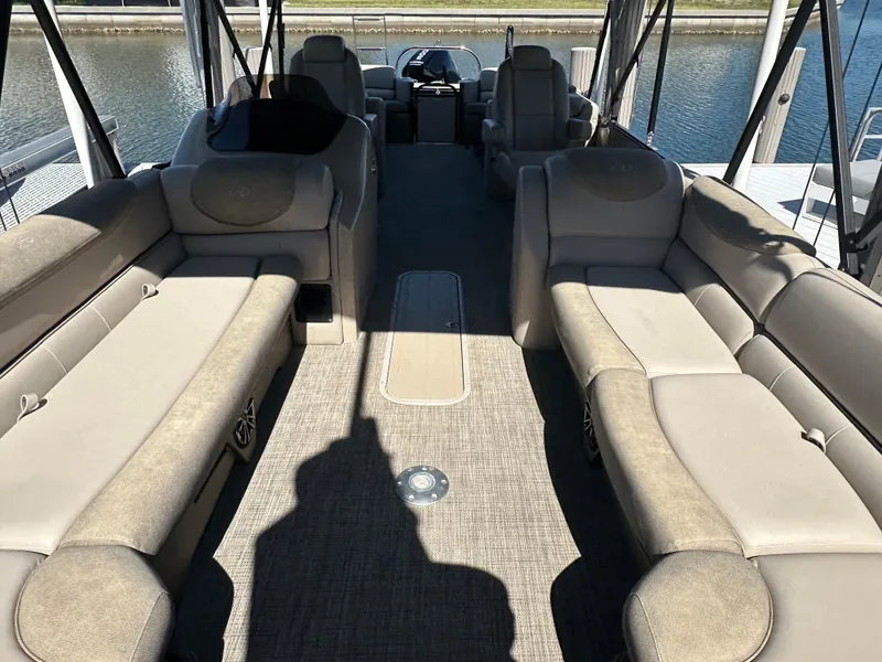 Slide: The Image of 2020 Avalon Catalina Platinum Quad Lounger boat interior with spacious seating and elegant design. - 9