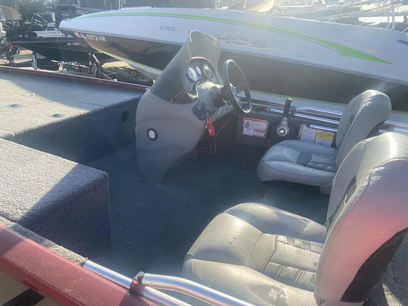 Slide: The Image of 2018 Tracker Pro 170 boat interior with steering wheel and seating. - 5