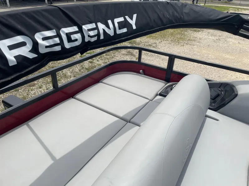 Slide: The Image of 2023 Regency 250DL3 boat with comfortable seating and sleek design. - 14