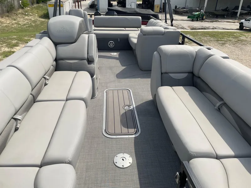 Slide: The Image of Close-up of damage on a 2023 Regency 250DL3 boat hull. - 12