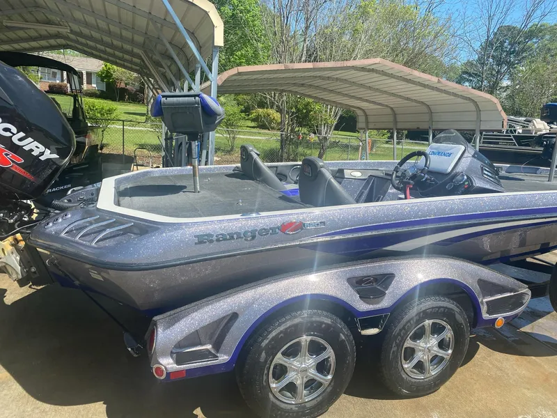 Slide: The Image of 2017 Ranger Z-520 "RANGER CUP EDITION" boat with Mercury engine, parked outdoors. - 3