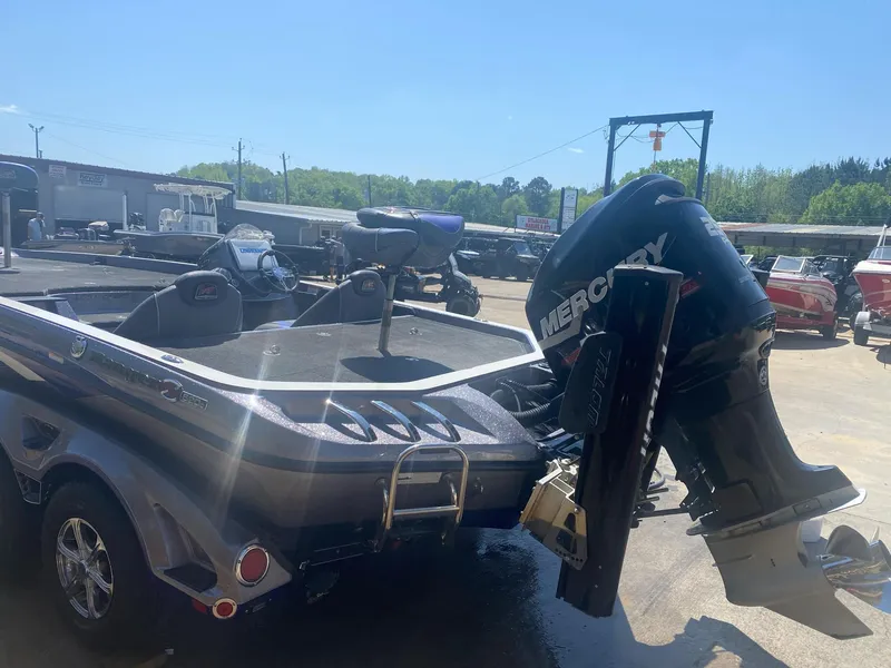 Slide: The Image of 2017 Ranger Z-520 "RANGER CUP EDITION" boat with Mercury outboard motor in a sunny marina. - 4