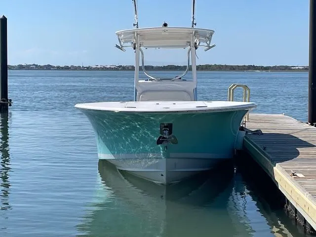 Slide: The Image of 2007 Southport 28 CC boat docked on calm water, front view. - 2