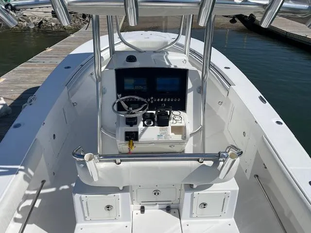 Slide: The Image of 2007 Southport 28 CC boat cockpit with steering wheel and control panel. - 22