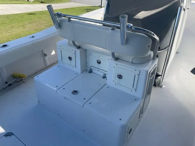 Slide: The Image of 2007 Southport 28 CC boat interior with seating and storage compartments. - 25