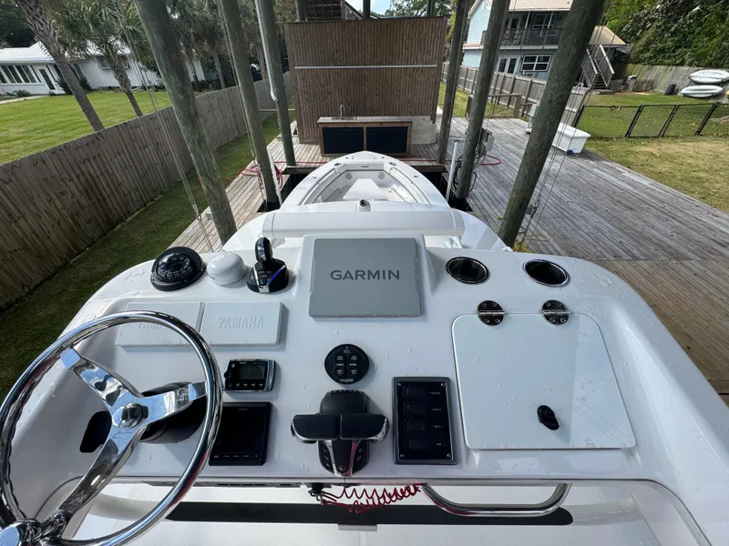 Slide: The Image of 2016 Everglades 435 Center Console boat helm with Garmin navigation system. - 25
