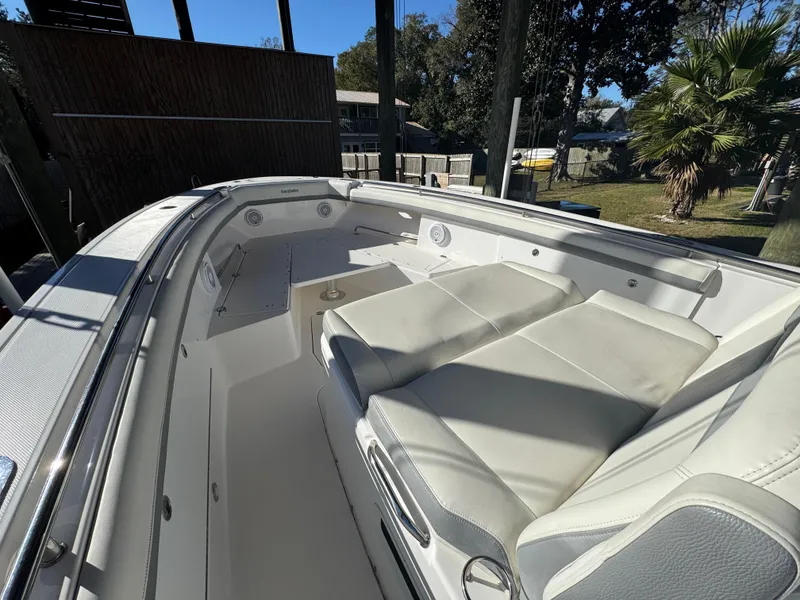 Slide: The Image of 2016 Everglades 435 Center Console boat with spacious seating and sleek design. - 27