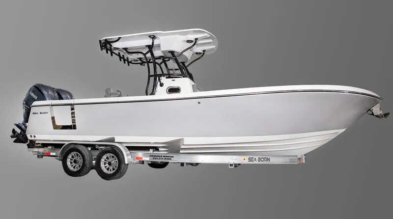 Slide: The Image of 2025 Sea Born LX26 Center Console boat on trailer, side view. - 2