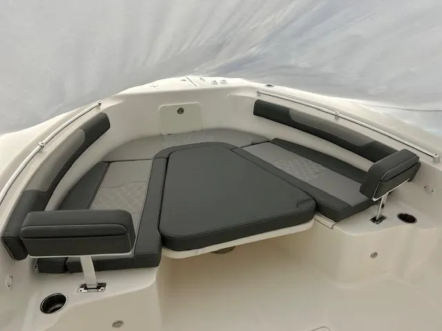 Slide: The Image of 2025 Sea Born LX26 Center Console boat with cushioned seating area. - 6
