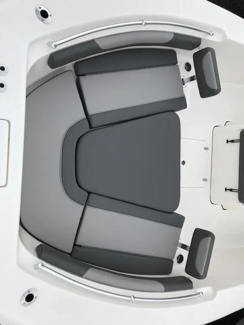 Slide: The Image of 2025 Sea Born LX26 Center Console boat interior with gray seating. - 7