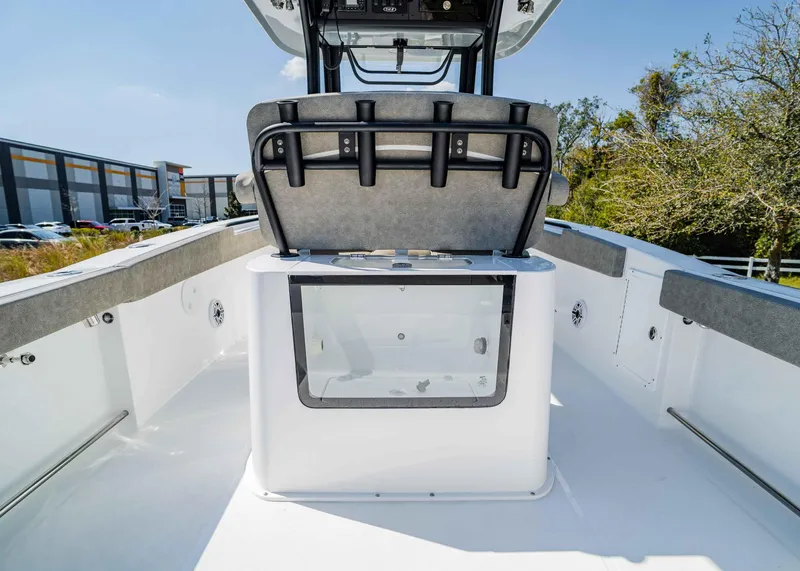 Slide: The Image of 2025 Sea Hunt Gamefish 27 FS boat interior with seating and storage. - 10