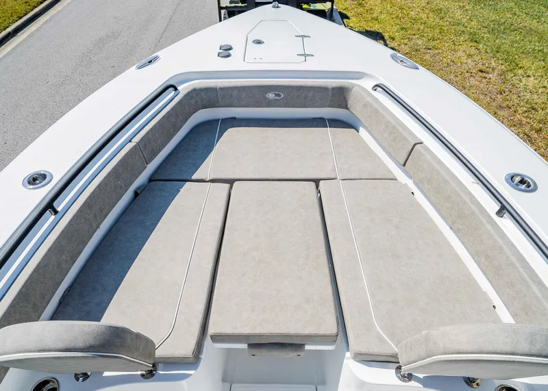 Slide: The Image of 2025 Sea Hunt Gamefish 27 FS boat with spacious cushioned seating area. - 22