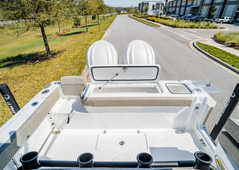 Slide: The Image of 2025 Sea Hunt Gamefish 27 FS boat interior with open storage and seating. - 7