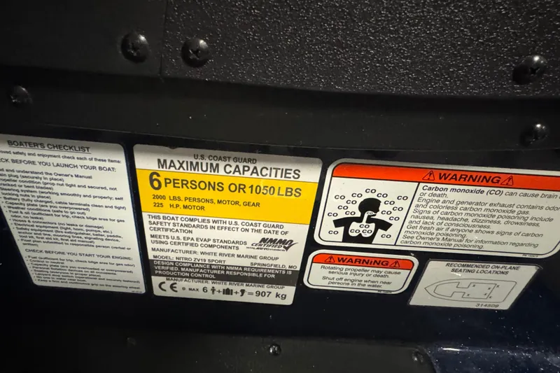 Slide: The Image of 2024 Nitro ZV19 Sport capacity and safety labels, highlighting maximum load and carbon monoxide warnings. - 10