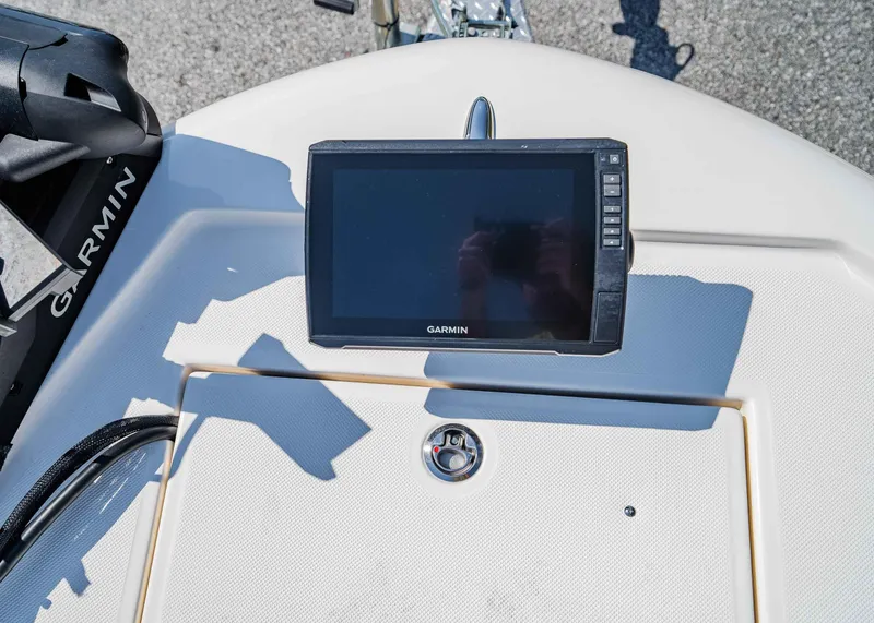 Slide: The Image of 2024 Spyder FX 19 Vapor boat with Garmin navigation system on deck. - 15