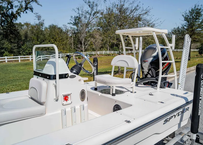 Slide: The Image of 2024 Spyder FX 19 Vapor boat with Yamaha engine, featuring sleek design and modern controls. - 5